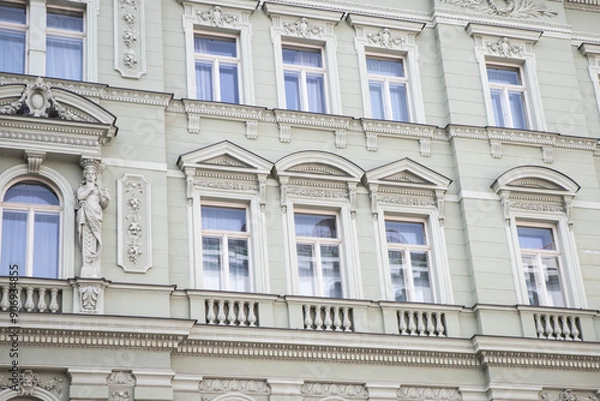 Fototapeta facade of a building, house with windows, old european architecture