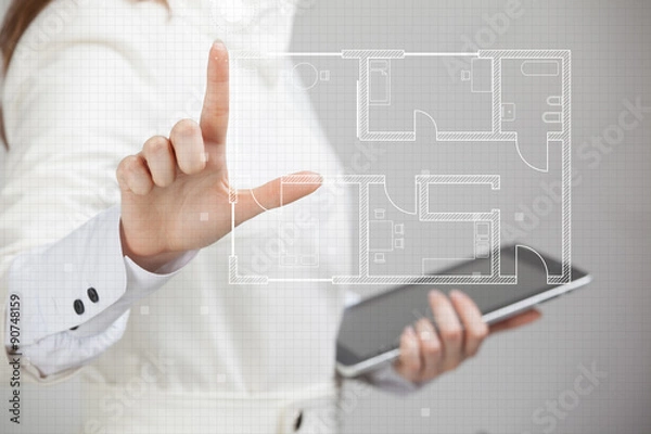 Fototapeta female architect working with a virtual apartment plan