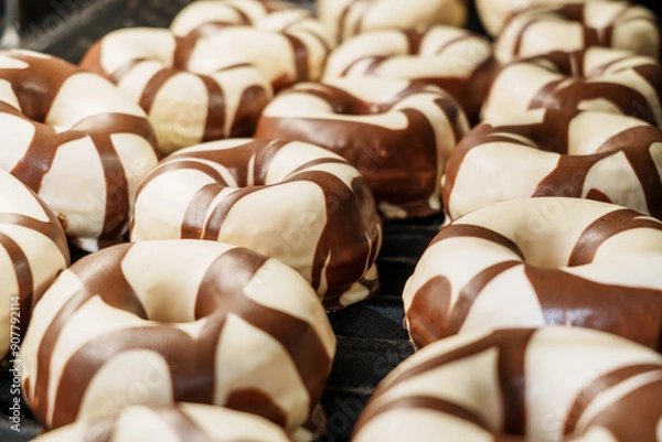 Obraz Chocolate and vanilla glazed donuts