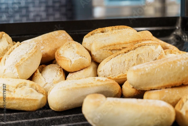 Obraz Freshly baked bread rolls on a tray