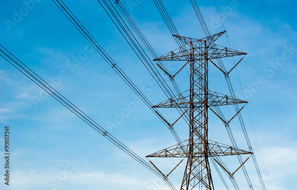Obraz High voltage transmission lines isolated on blue sky background