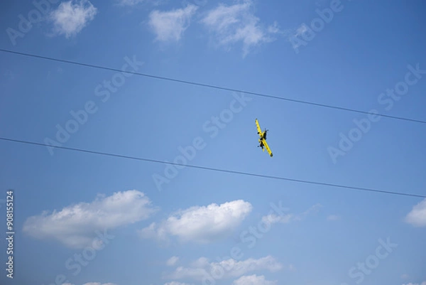 Obraz airplane between electric line