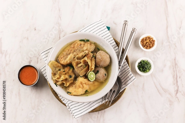 Fototapeta Top View Baso Cuanki Bandung, Meatball and Tofu Soup with Beef Broth.