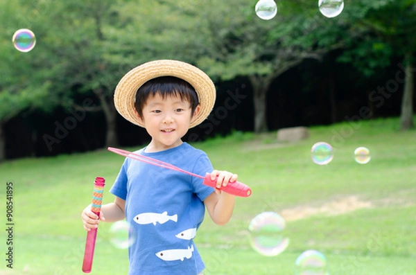 Fototapeta シャボン玉で遊ぶ子供