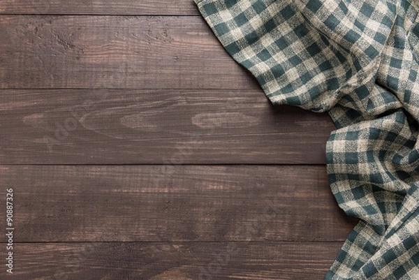 Fototapeta Napkin on the wooden background. Top view