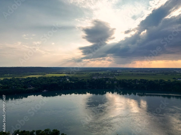 Obraz Aerial of Niagara-on-the-Lake and Queenston region of Ontario over the Niagara River from Lewiston, New York, crossing an international border to Canada. Shot on a rainy afternoon summer day, 2024.
