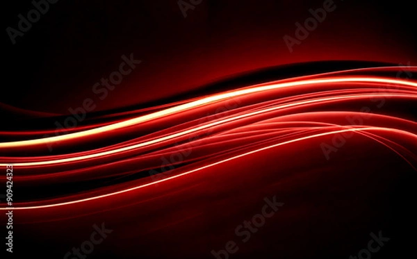 Fototapeta abstract of flowing light trails in vibrant shades of red and orange against a deep black background.