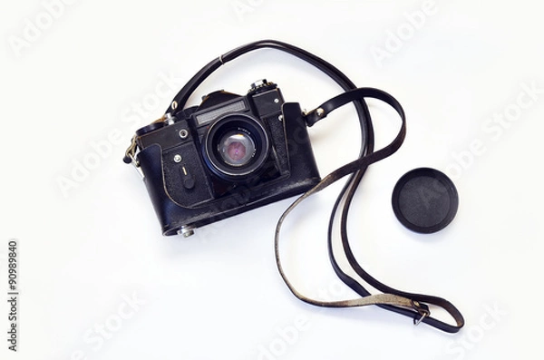 Obraz Old photo camera. Old photo camera on a white background. Camera in leather carrying case with strap, lens. Zenit.