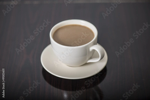 Fototapeta Soft focus Cup of coffee  on table