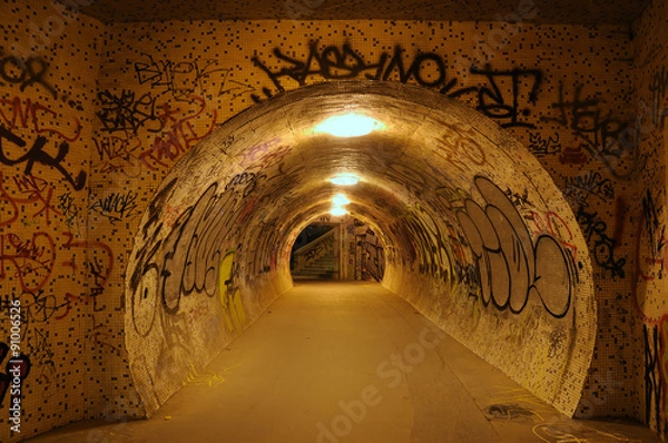 Obraz Photography of underground pedestrian passage with graffiti on the walls