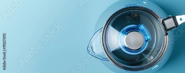 Obraz Blue electric kettle on a light blue background.