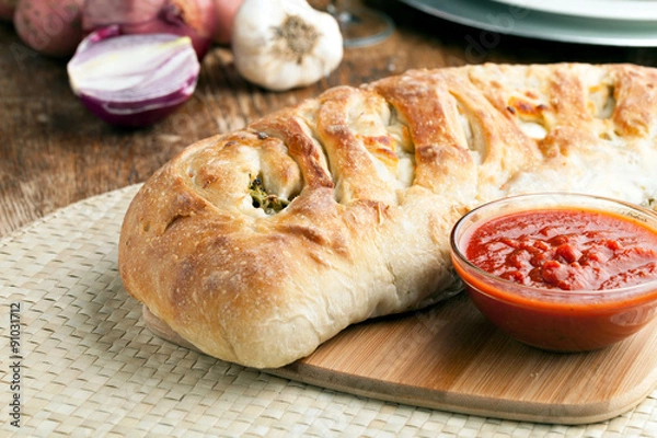 Fototapeta Stromboli Stuffed Bread