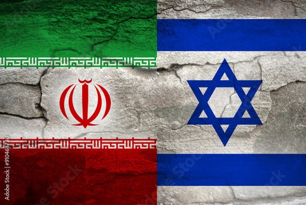 Obraz Iran Israel war. Flags of Israel and Iran displayed on a cracked concrete wall texture, creating a grunge background. This imagery symbolizes the concept of military conflict between the two nations