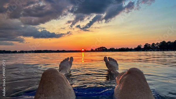 Obraz Watching sunset floating in river