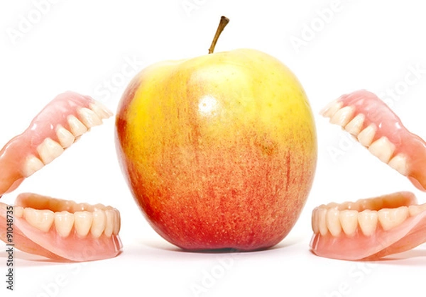 Obraz Two false teeth and an apple