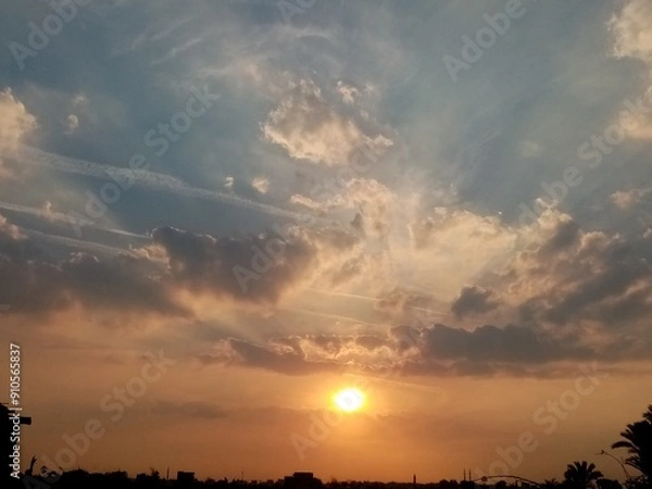 Fototapeta sunset in the clouds