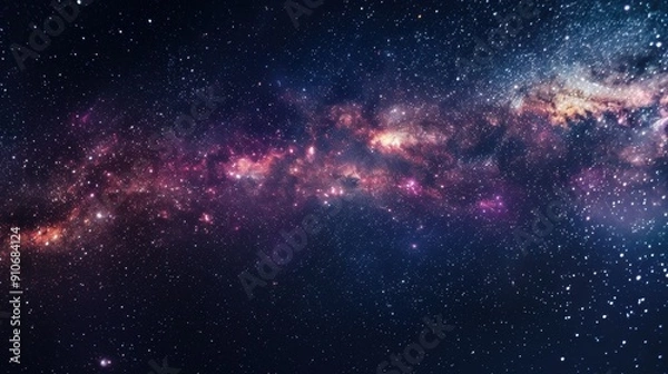 Fototapeta Stunning view of the Milky Way galaxy with colorful cosmic dust and bright stars, showcasing the vastness of the universe.