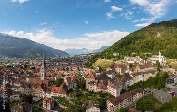 Fototapeta Chur, Switzerland: Aerial panorama of the Chur old town in Canton Graubunden in the alps in Switzerland. in summer