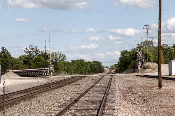 Obraz Eisenbahnstrecke - Doppelgleis mit Bahnübergang