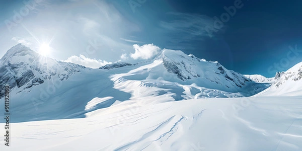 Obraz Snowy mountain peaks under a bright blue sky, winter wonderland, serene and peaceful. 
