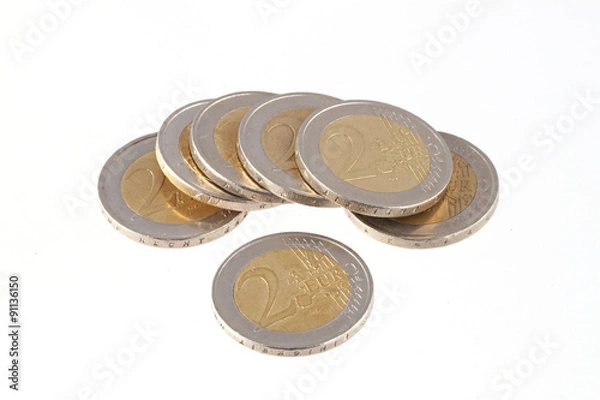 Obraz Close up photo of two Euro coins on a plain white background.