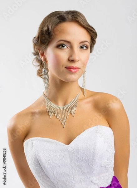 Fototapeta Young woman in wedding dress