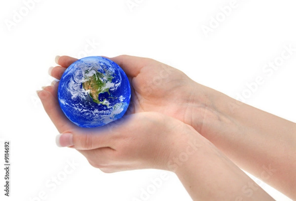 Fototapeta joined hands holding globe, shallow DOFShallow DOF