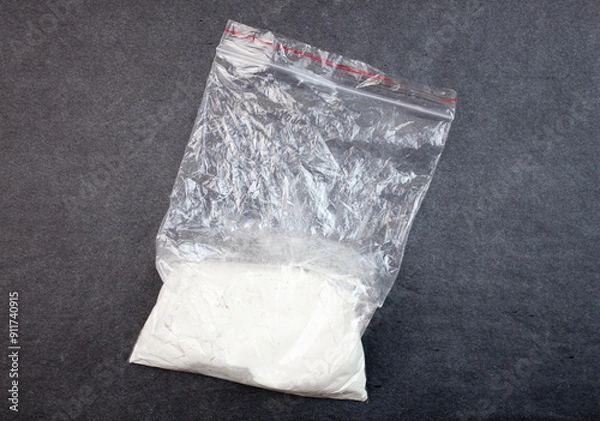 Obraz Bag of white narcotic substance. ZIP bag transparent with white powder, narcotic substance.