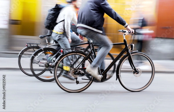 Fototapeta Three men on bikes