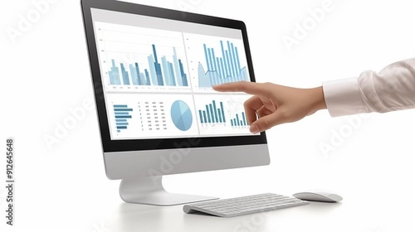 Obraz Businessman hand working with new modern computer and business graph.