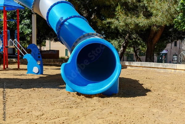 Fototapeta Blue Spiral Slide at a Playground