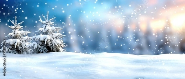 Fototapeta Snow-covered landscape with falling snowflakes, featuring frosty pine trees, and a calming blue sky with sun. Perfect winter wonderland scene.