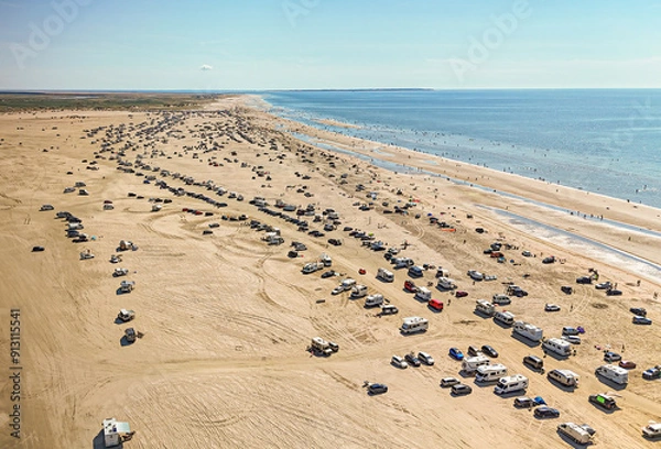 Obraz Danish lifestyle, campervans on the Romo beach, one of the biggest sandy beach in Europe. 