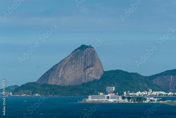 Fototapeta Rio de Janeiro Skyline from Rio Niteroi Bridge - Sugarloaf Mountain and Christ the Redeemer Statue Corcovado in the background