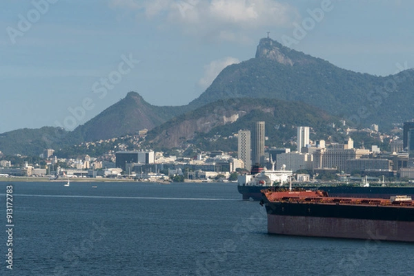 Fototapeta Cargo Ships in Guanabara Bay in Rio de Janeiro Skyline - Christ the Redeemer Statue in the background