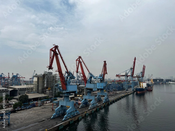 Obraz Container Ship Docked In The Port For Loading And Unloading Containers