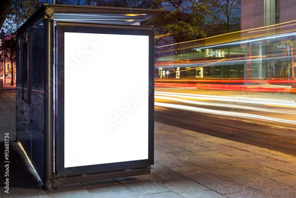 Fototapeta Blank White Mock Up Of Vertical Poster Light Box In A Bus Stop At Night
