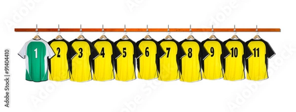 Obraz Row of Yellow and green Football Shirts hanging on wall
