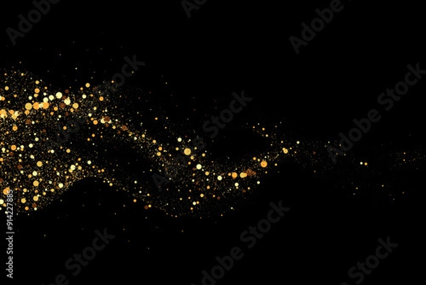 Fototapeta Scattered golden particles on dark background. Holiday background or design element. New Year and Christmas