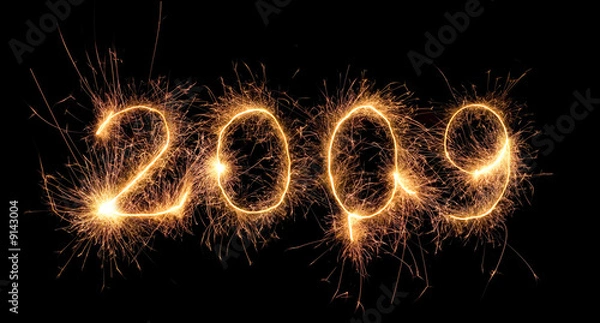 Fototapeta Bengal light - writing "2009". Very light. Isolated on black.