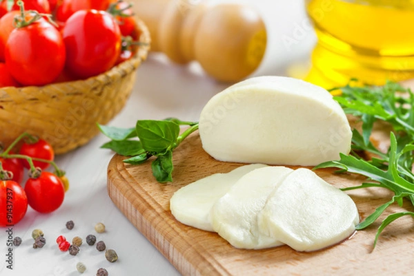 Obraz Cooking of salad with mozzarella and tomatoes