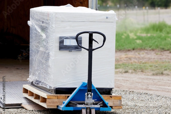 Obraz New home back up generator being unloaded
