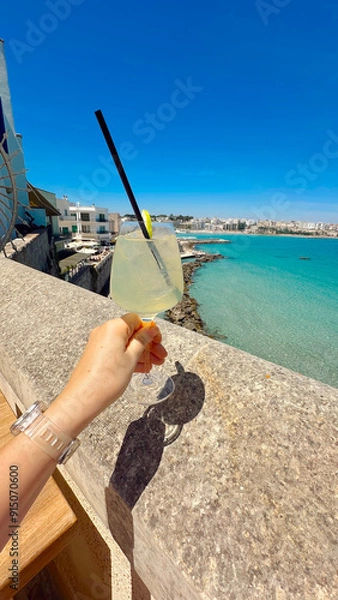Fototapeta person drinking limoncello 