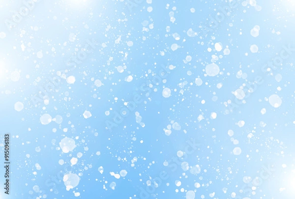 Fototapeta  White Bokeh Light Effects on Blue winter Background.