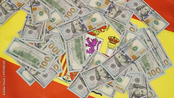 Obraz flag of Spain  and lots of hundred dollar bills 