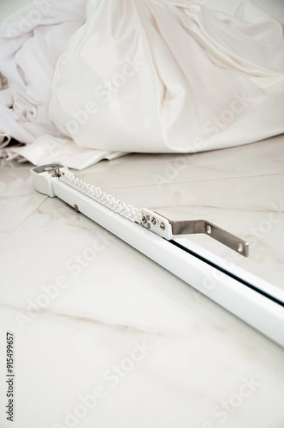Fototapeta Automatic cornices for curtains in white. Accessories for curtains
