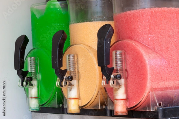 Fototapeta The machine gun doing the different frozen drinks