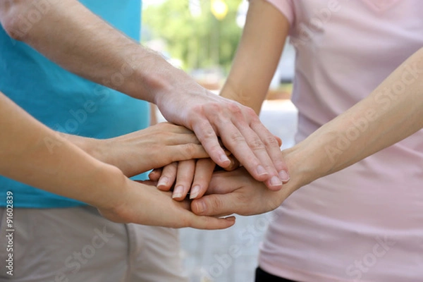 Fototapeta United hands outdoors