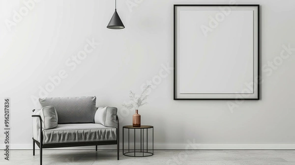 Fototapeta Blank picture frame mockup on white wall with chair and lamp. White interior living room design, view of modern style interior with artwork mock-up, Template for painting or poster