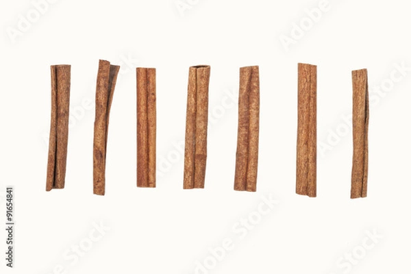 Obraz Mehrere Zimtstangen nebeneinander Freisteller